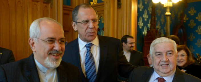 Russian Foreign Minister Sergei Lavrov, center, Iranian Foreign Minister Mohammad Javad Zarif, left, and Syrian Foreign Minister Walid Muallem in Moscow, Russia on Jan. 16, 2014. (AP Photo/Pool)